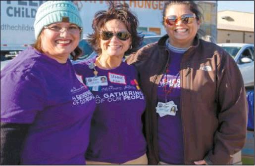 Courtesy photo Chickasaw Nation employees (from left) Angie Garrett, Tammy Volino and Martha Edelen volunteered at the “No Hunger Holiday” event in Sulphur. They played a role in assisting Murray County children and families during the holidays while bringing awareness to the important issue of childhood hunger.