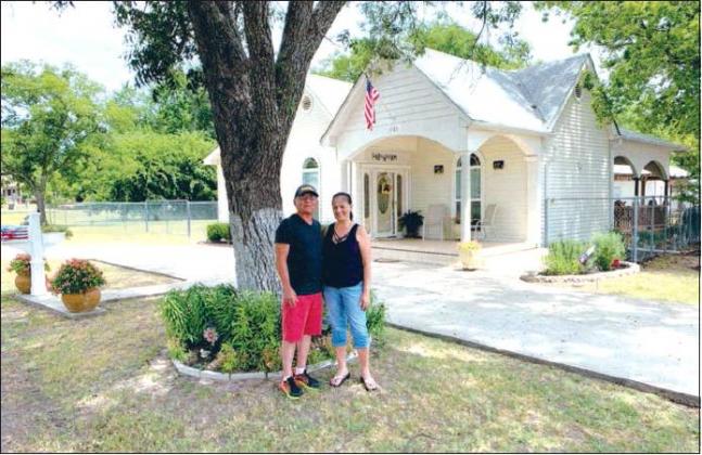 Courtesy Photo YARD OF THE MONTH Juan and Maria Lopez was chosen for the Madill Rose Garden Club Yard of the Month. Their beautiful yard and landscape can be seen at 509 South Third.