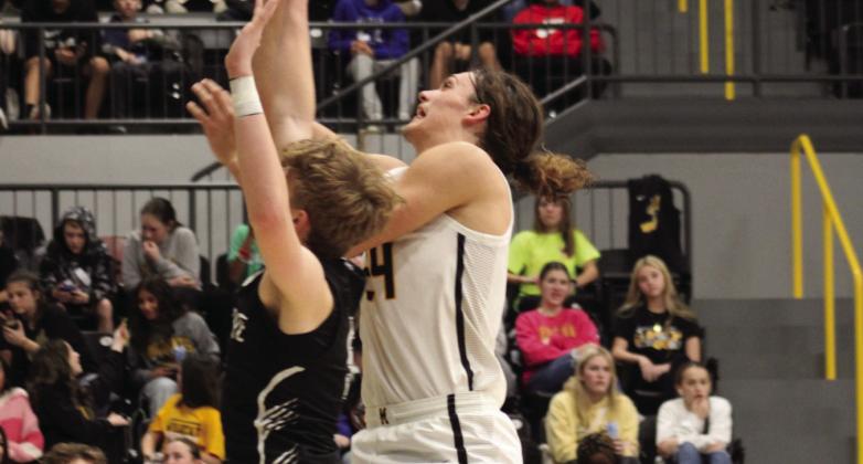 Ethan Wilkerson goes for a jump shot during the Madill v Lone Grove game. Photo courtesy of Summer Bryant