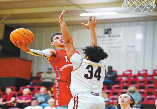 Brady Brister goes for a layup against Talihina on January 7, 2021. Crockett Uber