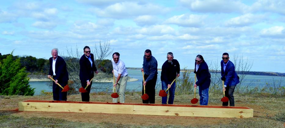 In November 2021, Pointe Vista executives and board members held a ground breaking ceremony to mark the construction of phase one of the new Pointe Vista development. From left to right: Mark Fischer, Owner Pointe Vista Development; Grant Speaks, Chief Operating Officer; Still Fontaine, Equity Bank; Steven Callendar, COO Skybridge Development; Paul Brightwell; Ryan Chapman, Operations Manager; and Malek Massad, FO Skybridge Development. Photo courtesy of Summer Bryant