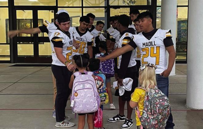 The Madill Wildcats football team participate in Fist Bump Friday on October 27. Courtesy photo