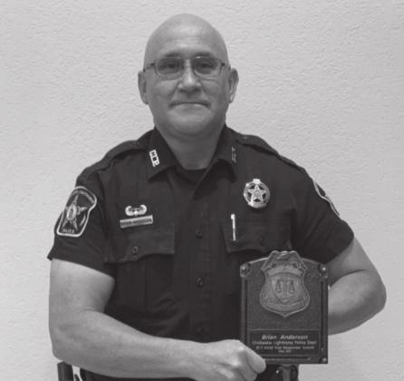 Chickasaw Nation Lighthorse Police Officer Brian Anderson poses with his First Responder Award. Courtesy photo