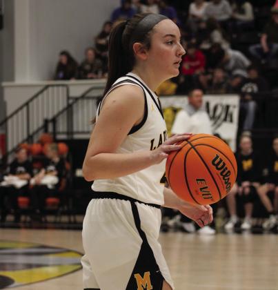 Senior Aubrie Cantrell sizes up the competition. The Lady Bulldogs beat the Lady Wildcats 47 to 31 on January 13. Summer Bryant