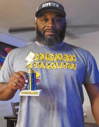 Top left: Charles Hall and Yolanda Williams, both of Madill won first place in the King of Tha Hill Team Domino Tournament. Top center: Dinky King and Randy Morris, both of Madill, won second place in the team tournament. Top right: Jeff Cheadle of Madill took first place in the King of Tha Hill Head to Head Domino Tournament. Bottom right: Kelly Menifee of Oklahoma City won second place in the Head to Head Tournament. Courtesy photos