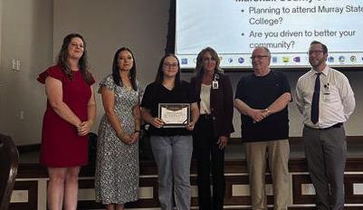 Tesla Stewart, pictured with FHCSO representatives, was awarded the Vickie Day Memorial Scholarship. Courtesy photo