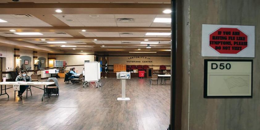 County health officials wait in a mostly-empty room at the Fort Sill Veterans Center in Lawton earlier this year when COVID-19 vaccinations were offered to facility staff. Whitney Bryen • Oklahoma Watch