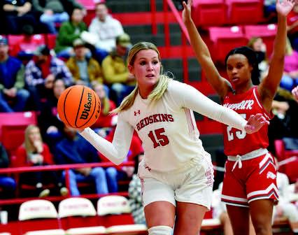 Ethel Stewart dribbles down the court during the Redskins vs Bulldogs game. Crocket Uber