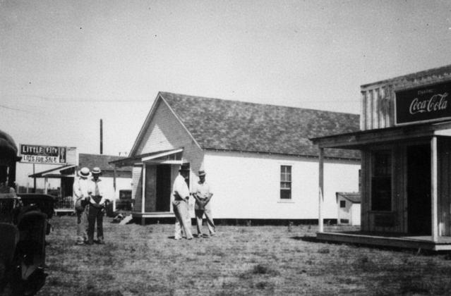 The Land Office is on the far left, the Palace Grocery is in the center and the new cafe is on the right. Courtesy photo