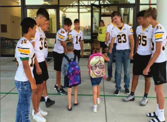 Wildcat participate in Fist Bump Friday