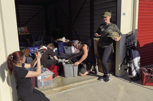 Darby Foster’s entire family enjoys buying abandoned storage spaces and discovering what is inside. Darby’s daugther, Anita, left, films her mother while the rest of the crew looks for valuables. Readers may follow them on YouTube at “millennialtreasurehunters.” Courtesy photo