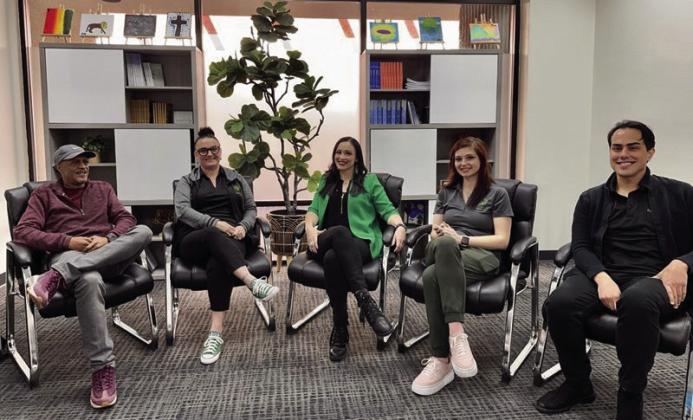Darby Foster, center, is surrounded by the staff of drug and alcohol counselors at the the Palo Verde Wellness Center. Courtesy photo