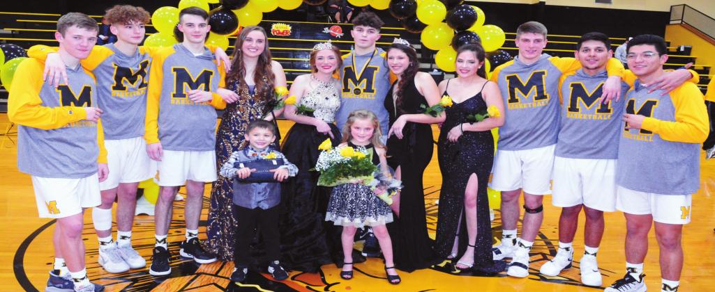 Members of the Madill basektball team join the the Madill Basketball Homecoming Court after the boys game against Plainview Jan. 28 at the MHS gym. Tony McSwain &amp;#x2022; For The Madill Record