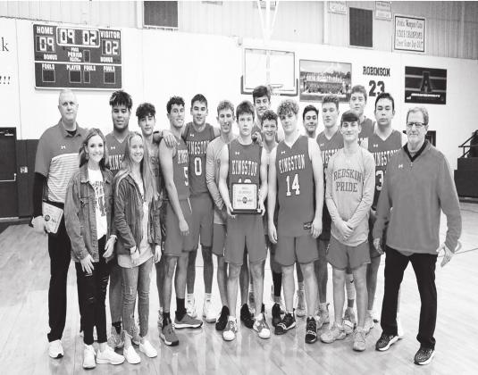 Crockett Uber • For The Madill Record Kingston and Madill boys basketball team celebrates its first place finish at the eighth annual Wampus Cat Classic in Atoka on Jan. 25.