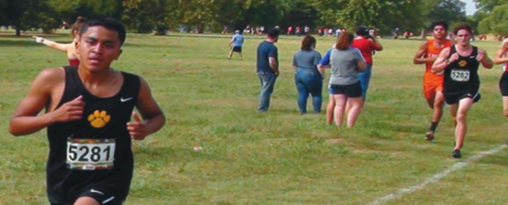 Anthony Sanchez and Brodie Tull run at the Waurika Invitational on October 10. Brandon Jacks