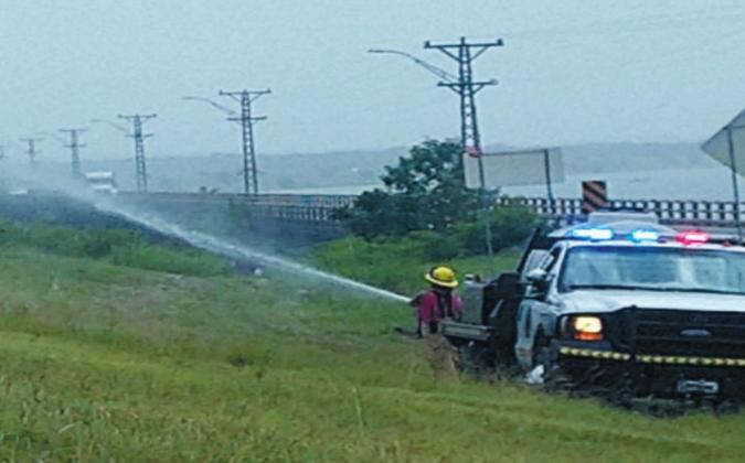 Texoma volunteer Firefighters Kimberly and Brandie Cissel Assist with the buming of a hill prior to the July 4th firework display Courtesy photo