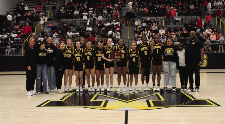 The MHS Lady Wildcats took the regional championship. Courtesy photos