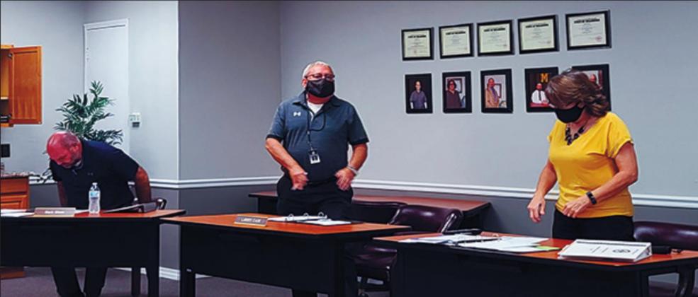 From left to right: Madill School Board Member Mark Glenn, Madill Superindent Larry Case, and Madill Public School Treasurer Carol Combs discussed many agenda items at the meeting on October 12, 2020. They were forced to make some harsh decisions. James Bowser • The Madill Record