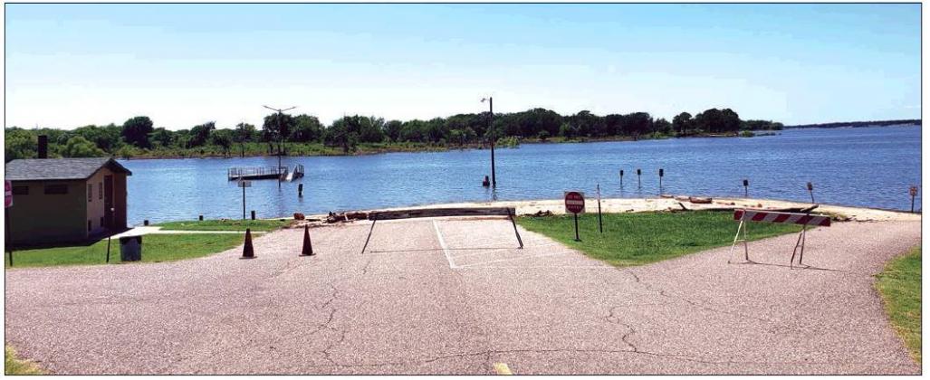 Matt Caban - The Madill Record HIGH water levels at the Johnson Creek campsite have resulted in the closure of its boat ramp as seen in this photo from June 24. It is one of four sites run by the U.S. Army Corps of Engineers that has closed boat ramps.