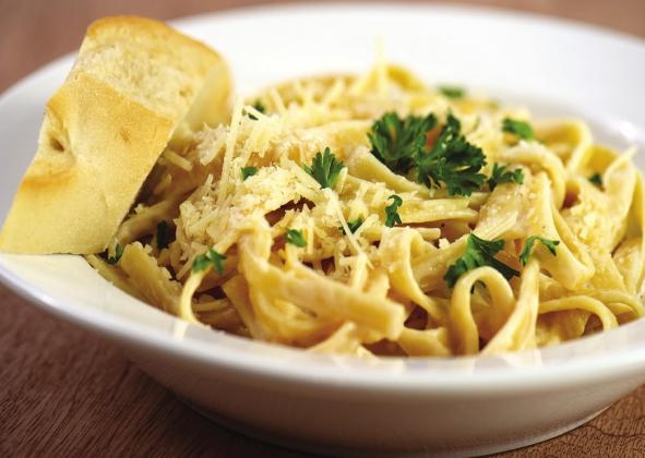 Thickened low-fat milk can be used in lieu of heavy cream in dishes like fettuccine alfredo. Courtesy photo