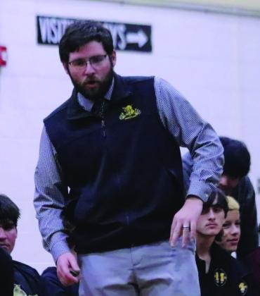 Cale Eidson, pictured left, was named Region 6 Track Coach of the Year. Madelyn Ritchie, pictured center, was named Region 6 Female Athlete of the Year. Austin Pettigrew, pictured right, was named Region 6 Girls Wrestling Coach of the Year. Courtesy photos