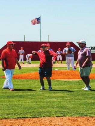 Coach West throws out the first pitch of the Regional game on May 8, 2022. Linda Holmes