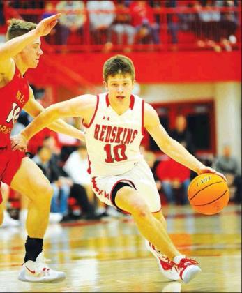 Crockett Uber • For The Madill Record Kingston boys basketball player Kaden Johnson (10) drives past a Dale defender in the 2020 New Year’s Classic Boys Championship Game Jan. 11 inside the KMAC at Kingston High School. Dale claimed a 56-49 victory.