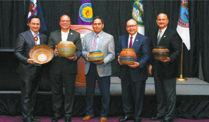 Courtesy photo Tribal leaders at the Inter-Tribal Council of the Five Civilized Tribes stand with gift baskets presented by the Cherokee Nation, which hosted their quarterly meeting Jan. 10 at the Hard Rock Hotel and Casino Tulsa. From left, Cherokee Nation Principal Chief Chuck Hoskin Jr., Choctaw Nation of Oklahoma Chief Gary Batton, Muscogee (Creek) Nation Principal Chief David Hill, Chickasaw Nation Governor Bill Anoatubby and Seminole Nation of Oklahoma Chief Greg Chilcoat.