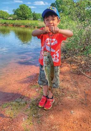 For Mitch Downing’s sixth birthday, a family friend took him fishing and he caught a nearly 2 lb. bass at Kids Lake in Oklahoma City, his biggest fish ever. Later, he told the family friend, “This is the best day of my life!” Photo Courtesy of Oklahoma Department of Wildlife Conservation
