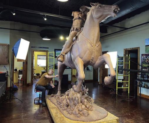 James Blackburn sculpts the full-size Chickasaw Lighthorse moment. The sculpture stretches 10 feet from its base to its tallest point. Courtesy photo