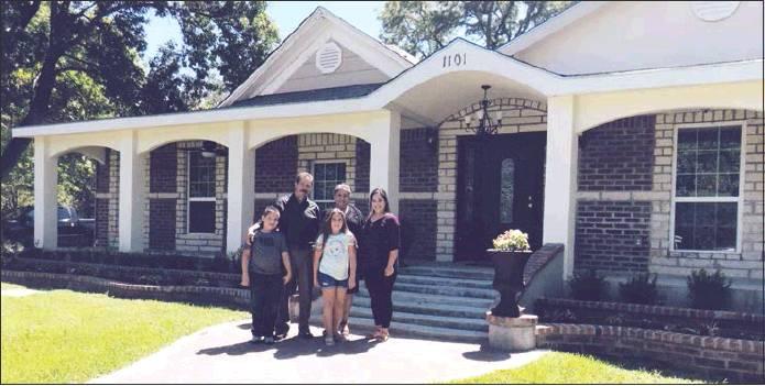 Courtesy Photo The Madill Rose Garden Club selected Nicolas and Maria Perez’s home for the September Yard of the Month. Nicolas planned the yard out, laid it out and built the porch, raised the flower beds and paved the brick front wall. The flower beds have English dwarf boxwood shrubs amid colorful wax begonias. Pictured is Nicolas and Maria, Ana and Adalverto Perez and Ariana Gach.