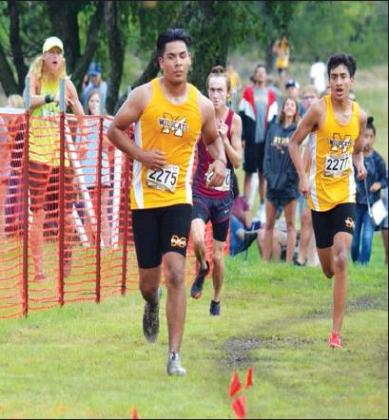 Matt Caban • The Madill Record MADILL senior Ulisses Camacho (left), Byng sophomore Harley Cobb (center) and Madill junior Miguel Duran (right) compete in the High School Boys 3.1 Mile Run at the 2019 Madill Cat Run August 31 at City Lake.