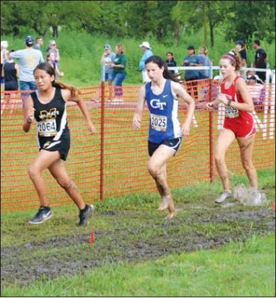 Matt Caban • The Madill Record MADILL freshman Suzette Lopez (left), Gunter sophomore Natalie Stephan (center) and Kingston senior Kamry Bohannon compete in the High School Girls 3.1 Mile Run at the 2019 Madill Cat Run August 31 at City Lake.