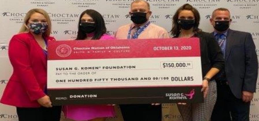 Courtesy photo On Tuesday, Oct. 13, Choctaw Nation of Oklahoma and Choctaw Casinos &amp; Resorts presented a check to Abi Lee, Chief Executive Officer of Susan G. Koman Oklahoma to help fight the cure.