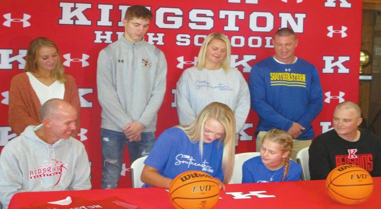 Avri Weeks, a senior at Kingston High School, signs her intent to play basketball for Southeastern Oklahoma State University for the fall 2021 season. She follows a long line of family members who have played for SE. Brent Smith • The Madill Record