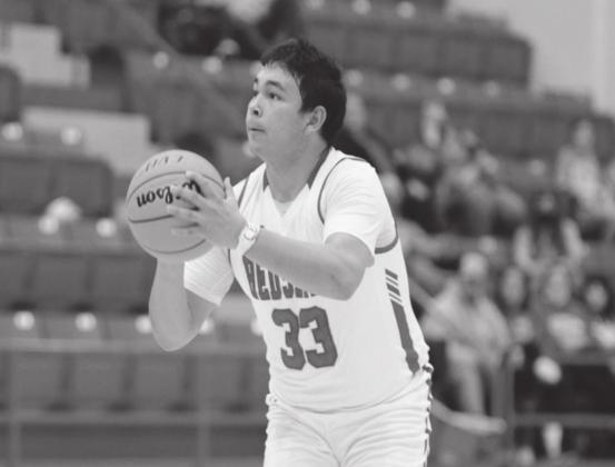 Dakota Weibner lines up for a shot during the January 19, 2021 Redskins vs. Broken Bow game