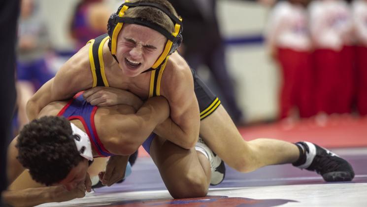 Madill’s Triston Barnes takes on Klayton Smith from Durant. Matt Swearengin