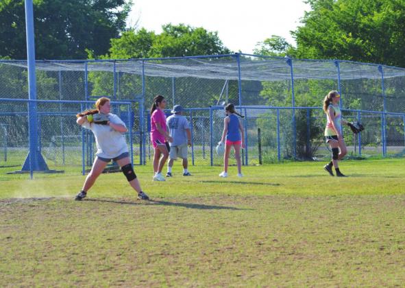 Familiar face takes over as new Madill fast-pitch coach