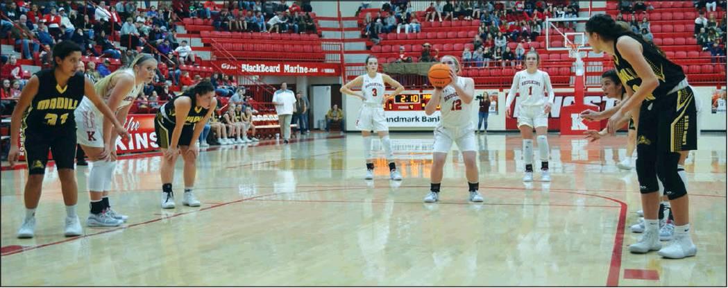 Matt Caban • The Madill Record Kingston’s Emi Osteen (12) takes a free throw during a Dec. 10 game against Madill at the KMAC. Both Kingston basketball teams traveled to Harrah for a tournament starting Dec. 12.