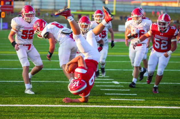 Redskin Reid Patterson tumbles into the end zone to score a touchdown. Matt Swearengin