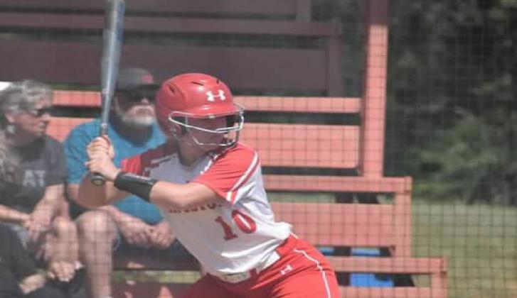 Senior Emi O’Steen, #10, is at bat, setting up to help the Lady Redskins beat the Indians on September 25. T.J. Harkins