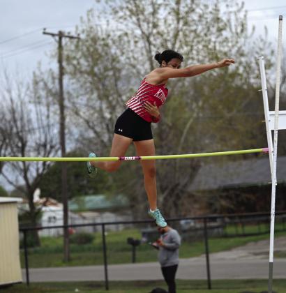 Isaac Hahn, pictured left, won the discus event and set a school record with a toss of 144 feet and 8 inches. Alyssa Langord, pictured right, won the pole vault event with a jump of 10 feet. Photos courtesy of Mindy Weeks