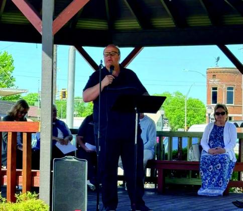 Pastor Travis Williams leads residents in prayer during the National Day of Prayer event on May 7. Courtesy photo