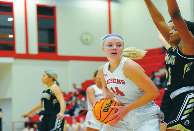 Avri Weeks fends off her opponent during the New Year’s Classic Tournament on January 7, 2021. Crockett Uber