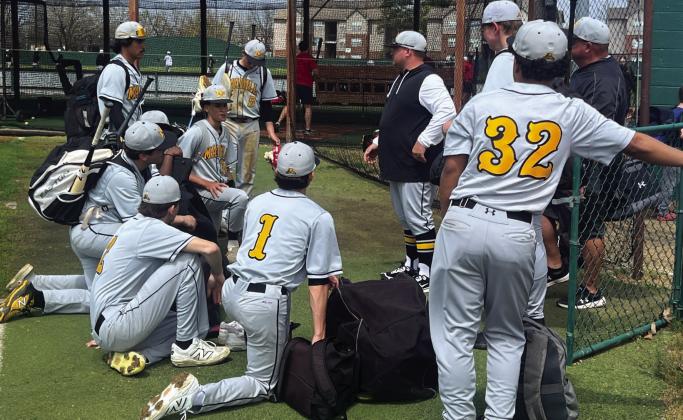 The Wildcats coach addresses the team before the game. Courtesy photo