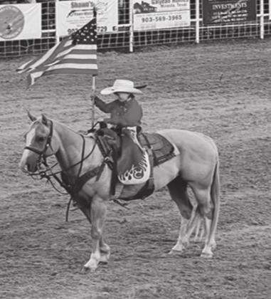 Denim Cook presents the American Flag at the Mineola Rodeo. Courtesy photo