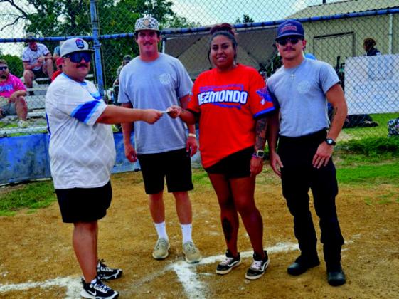 The Madill Fire Department held a benefit and a Homerun Derby. Bubba Roberts won the male division with seven homeruns. He was awarded a custom belt. The female winner was Kristen Scott with two. Courtesy photos