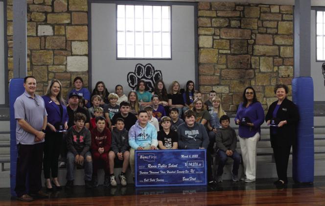 On March 12, BancFirst donated over $14,000 to Ravia Public Schools for fencing on their ball fields. Courtesy photo