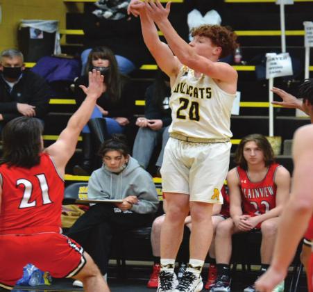 Stephen Sisco does a jump shot during the Wildcats v the Indians on February 12, 2021. Summer Bryant •The Madill Record