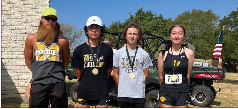 Three Madill cross country athletes were named All-Conference. From left to right: Coach Eidson, Jose Camps, Triston Barnes and Yadira Barbosa. Courtesy photos